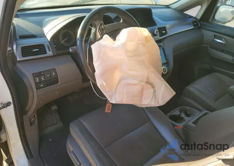 2014 Honda Odyssey Exl z USA, uszkodzony, nr VIN 5FNRL5H67EB028214